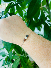 Grief bracelet with Rhodonite, Moonstone & Snowflake Obsidian gemstone beads