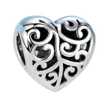 swirly heart charm