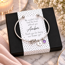 Flower girl gift. We couldn’t have tied the knot without you, thank you for being our flower girl . Personalised silver knot bangle with initial and birthstone charms. Flower girl favour. 