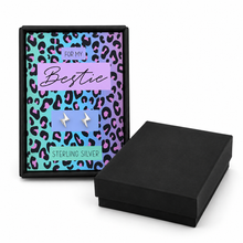 Silver bestie earrings with gift box. A boxed pair of silver lightning bolt stud earrings displayed on a colourful leopard-print card that reads 'FOR MY Bestie' and 'STERLING SILVER’ gift for best friend 