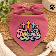 A pink pet bandana with a bow and a colourful 'Favourite' graphic, Favourite dog scarf 