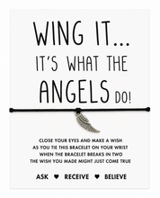 Angel wing bracelet gift. A black cord bracelet with a silver wing charm displayed on a white card that reads 'WING IT.