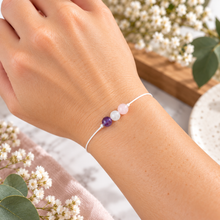 Pregnancy bracelet made with natural moonstone amethyst and rose quartz crystals 