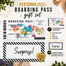 Personalised boarding pass gift set featuring a printed boarding pass card, a surprise envelope, a small surprise card, and a scratch-off heart sticker, arranged on a light background with decorative props.