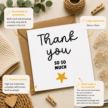 A square white thank-you card with black script text reading 'Thank you SO SO MUCH' and a small gold star, styled on top of a kraft envelope with decorative dried flowers, a yarn ball, wooden clothespins, and callout bubbles explaining eco-friendly materials, size, and personalization.
