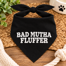 Bad mutha fluffer dog bandana in black with white text. Funny slogan dog scarf. Adjustable tie on dog bandana. Bad Mother Fluffer.