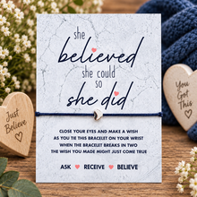A square marble patterned card with the phrase 'she believed she could so she did' wish a black cotton cord bracelet and silver heart charm attached. She believed Empowerment encouragement wish string bracelet.