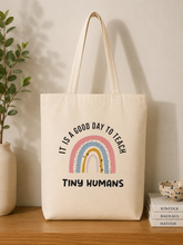 IT IS A GREAT DAY TO TEACH TINY HUMANS TOTE BAG
