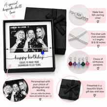 Personalized sterling silver birthday keepsake chain necklace with birthstone pendants, shown in a black gift box with a black ribbon. The image includes informational callouts about the necklace being made from 925 sterling silver, the chain being 16 & 18 inches, the choice of birthstone pendants, and a customizable photo frame example.