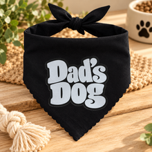 A blue and white pet bandana with a tie-neck loop, featuring the text 'Dad's Dog' in white letters on a plain black bandana background. Dads dog bandana. Funny slogan dog scarf tie on adjustable.