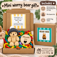 Open and closed views of a 'Mini worry bear gift' box set. The open box contains a small beige teddy bear wearing a gray beanie and a wooden 'little pocket HUG' token, surrounded by colorful shredded paper filler.