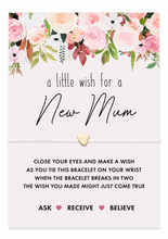 New mum wish bracelet. White cotton cord bracelet with small silver heart bead charm. Displayed on the bride keepsake card with wish instructions. 