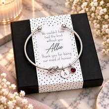Maid of honour gift. We couldn’t have tied the knot without you, thank you for being our maid of honour. Personalised silver knot bangle with initial and birthstone charms. Maid of honour favours. 
