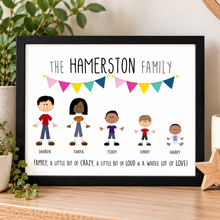 A framed personalised family portrait print features the text 'THE HAMERSTON FAMILY' above five cartoon children with their names, plus a banner and the caption 'FAMILY, A LITTLE BIT OF CRAZY, A LITTLE BIT OF LOUD & A WHOLE LOT OF LOVE!'. Family stick people gift.