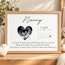 Personalised pregnancy announcement gift for grandparents. A personalised baby keepsake print on a wooden surface, featuring the word 'Grandparents,' a heart-shaped ultrasound photo, due date marked on calendar with a red heart mark, and a sentimental message.