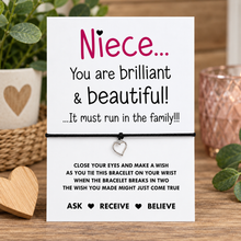Niece wish string bracelet. Gift for niece. A white card with a message for a niece, tied with a black cord and small silver heart charm