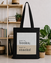 MIGHT BE BOOKS MIGHT BE SNACKS BLACK TOTE BAG