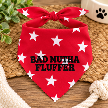 Bad mutha fluffer dog bandana in red & white star print with black text. Funny slogan dog scarf. Adjustable tie on dog bandana. Bad Mother Fluffer.