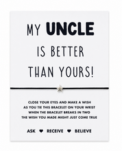 A white rectangular card with black text reading 'MY UNCLE IS BETTER THAN YOURS!' and a small silver star bracelet centered across the middle. Smaller text below explains the wish Instructions tied to the bracelet. Gift for uncle. 