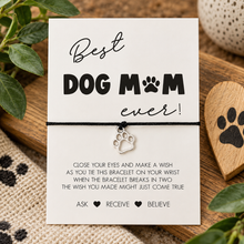 Dog mom wish string bracelet. Dog mum gift. Silver dog paw charm a black cotton cord bracelet displayed on best dog mum ever card. Wish instructions included. 