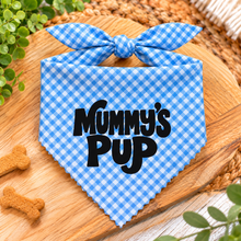 A blue and white gingham pet bandana with a bow on top, featuring the text 'Mummy's Pup' in black. Mummys pup adjustable dog bandana. Mums puppy dog scarf in blue and white check.