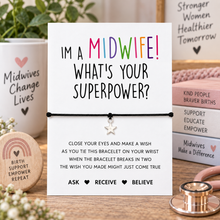 Midwife wish string bracelet. A white display card card reading 'I'M A MIDWIFE! WHAT'S YOUR SUPERPOWER?' with a black cotton cord bracelet featuring a silver star charm.
