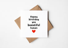 Birthday card with 'Happy birthday you beautiful human' text and a heart on a white background