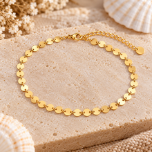 A delicate gold disc anklet. Gold ankle bracelet