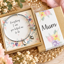 Personalised Silver charm bangle for mum. Perfect for a birthday or Mother’s Day gift for Mum. Simple silver bangle complete with 3 charms.