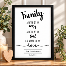 A framed typographic wall art print with the word "Family" in large script and the phrase "A LITTLE BIT OF crazy A LITTLE BIT OF loud & A WHOLE LOT OF love" plus the names "The Robinsons" and "Est.2002". Personalised family print 