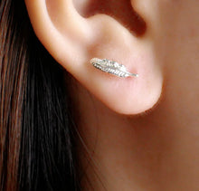 delicate silver feather earrings