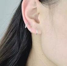 tiny silver hoop earrings